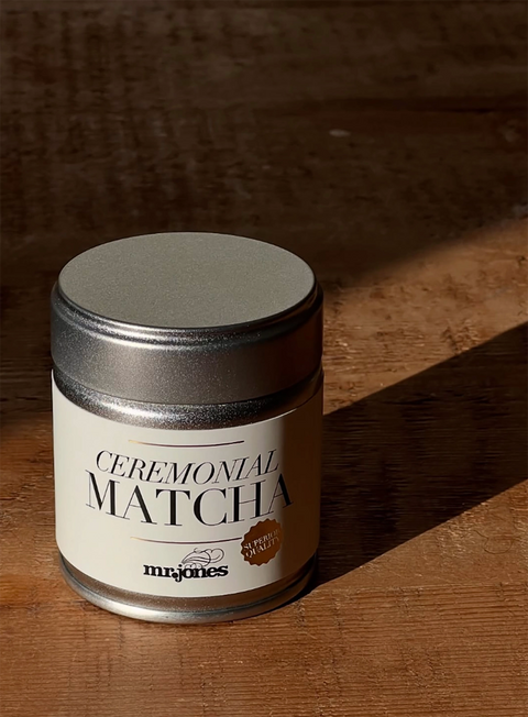 Ceremonial matcha from Mr Jones in a container on a wooden surface