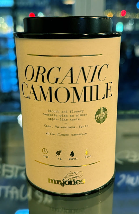 Mr Jones Organic Camomile tea packaging with a blurred background